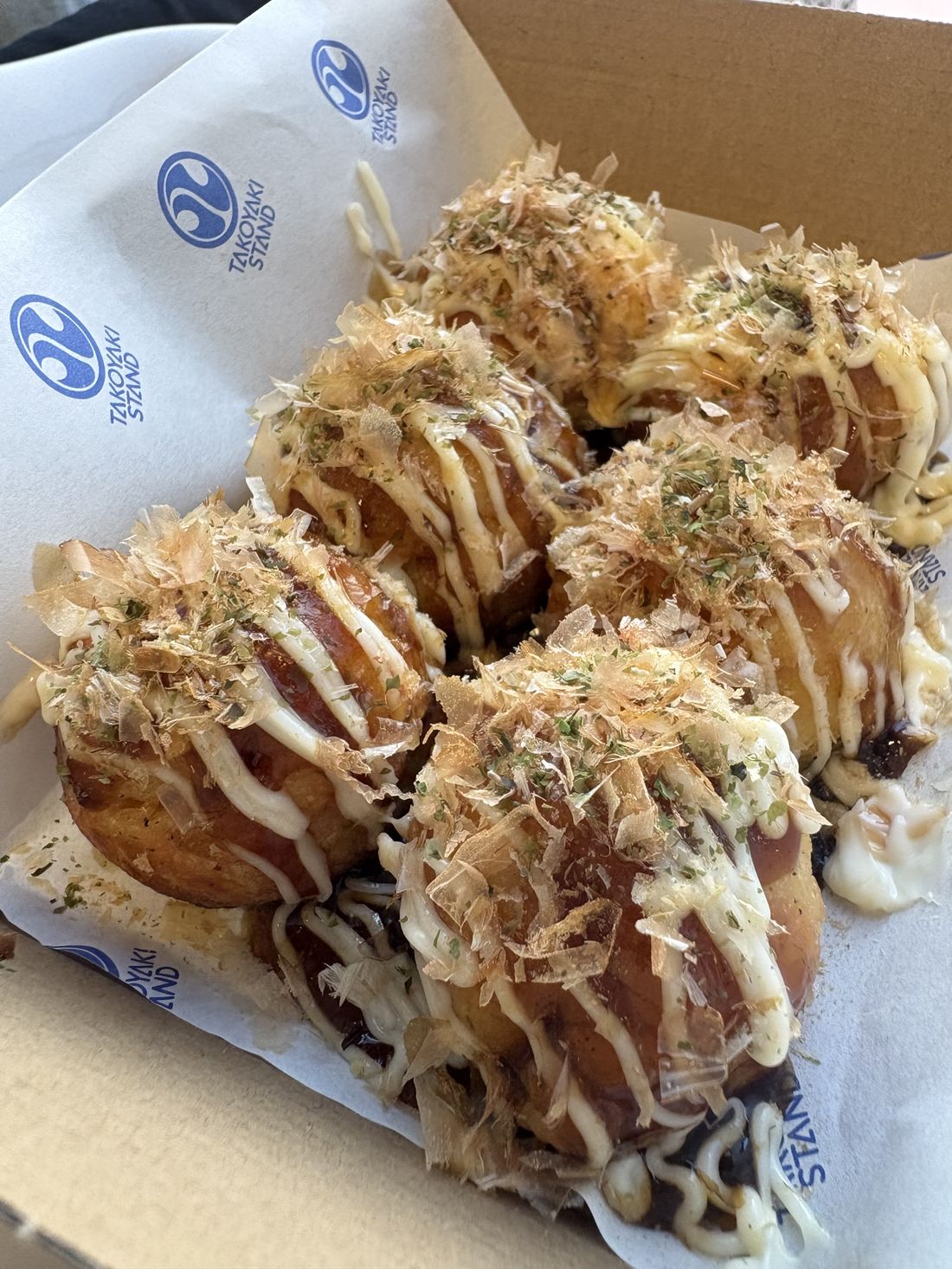 The OG takoyaki with bonito flakes, mayo, and takoyaki sauce