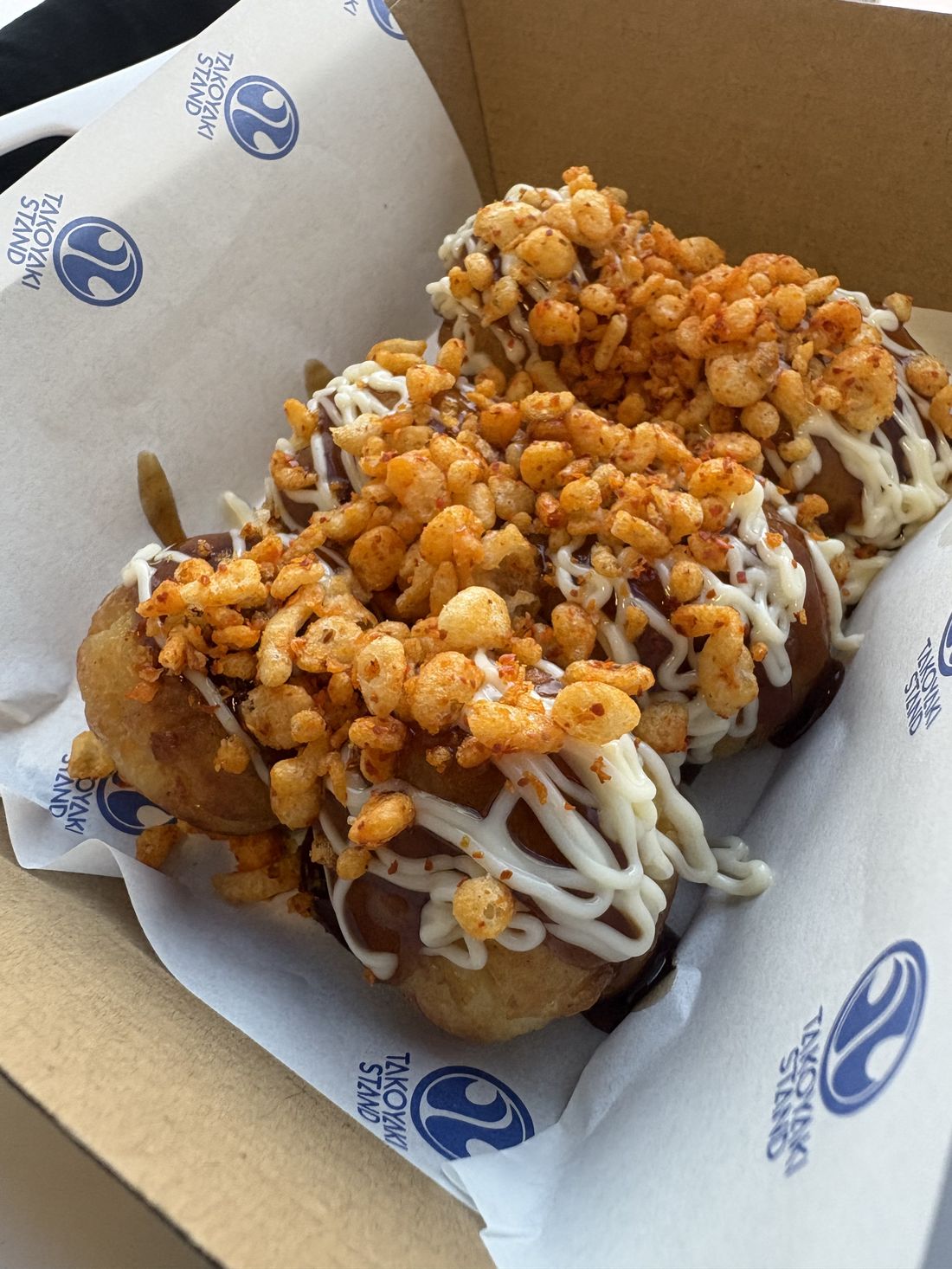 Spicy Crunchy takoyaki with spicy tempura crunches and mayo